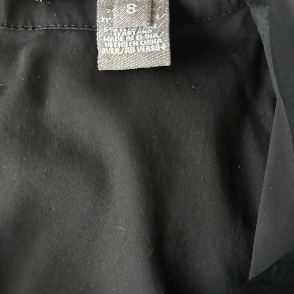 Ellen Tracy Black Sleeveless Top With Bow on the Front and Zipper Down the Back. - Picture 4 of 5